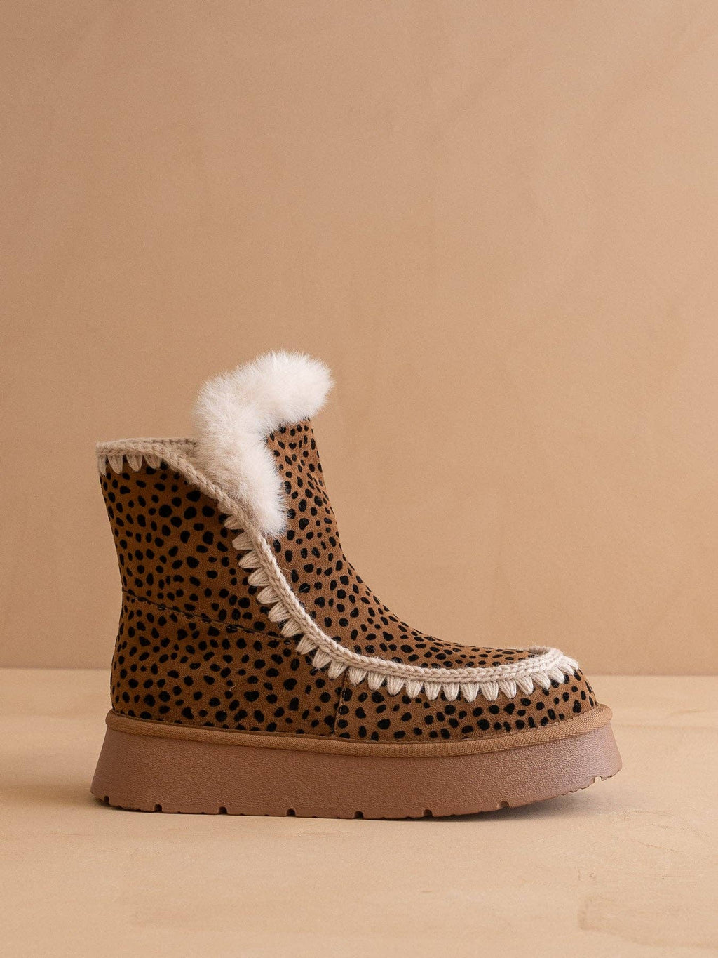 The Joyce Dark Cheetah Shearling Trim Platform Boot