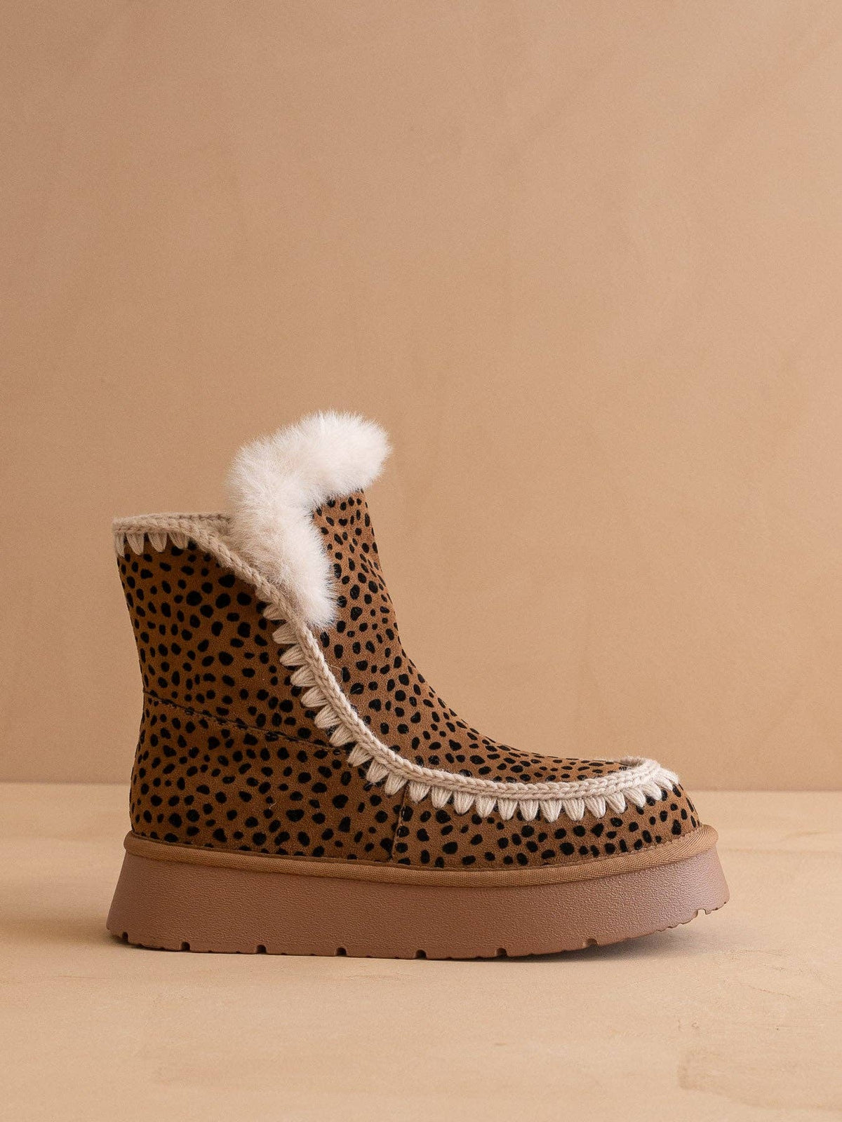The Joyce Dark Cheetah Shearling Trim Platform Boot