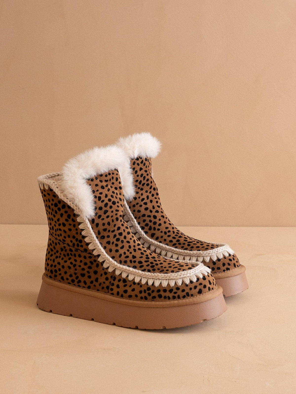 The Joyce Dark Cheetah Shearling Trim Platform Boot