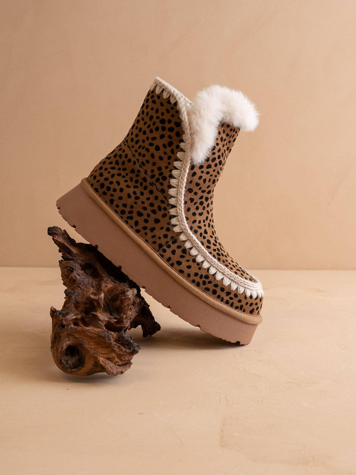 The Joyce Dark Cheetah Shearling Trim Platform Boot