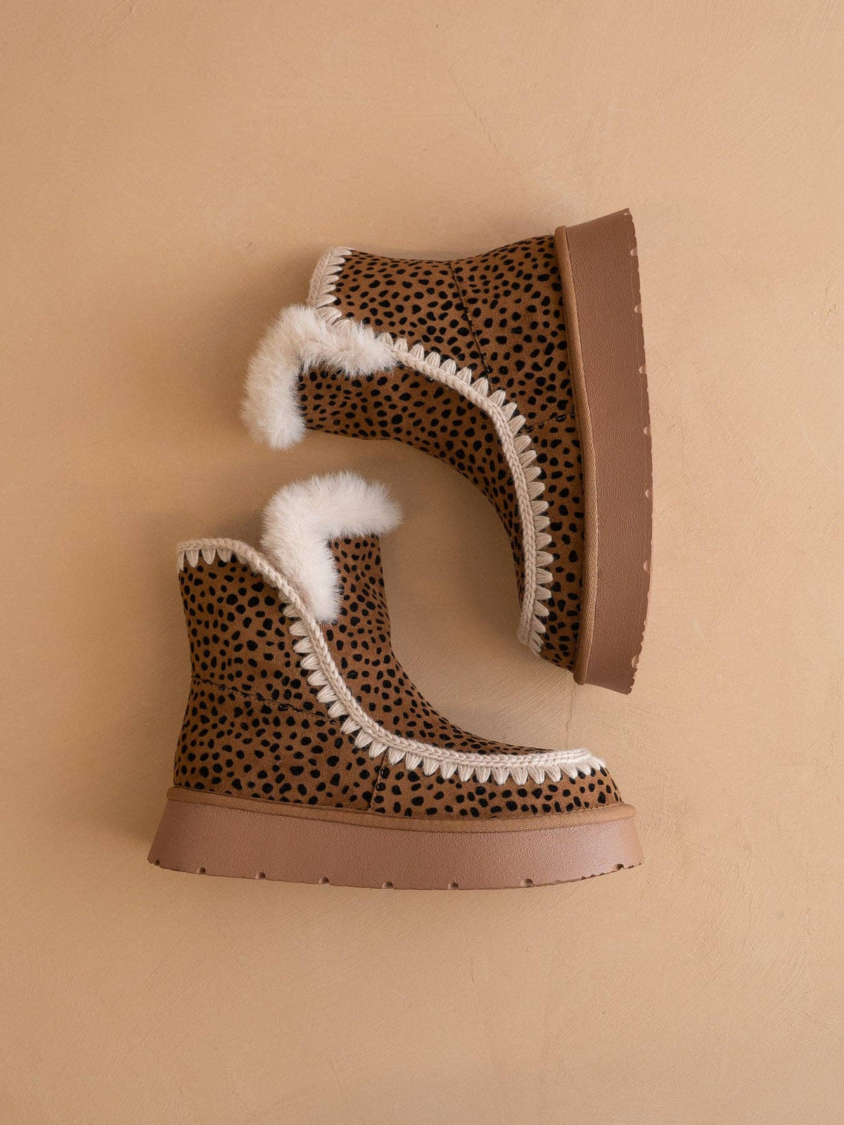 The Joyce Dark Cheetah Shearling Trim Platform Boot